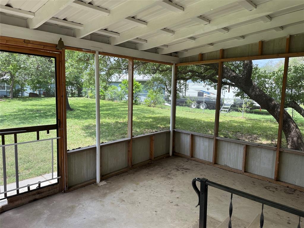 406 South Williams Street Hamilton, TX 76531 - Photo 30 of 35 a view of a porch with wooden floor and outdoor space