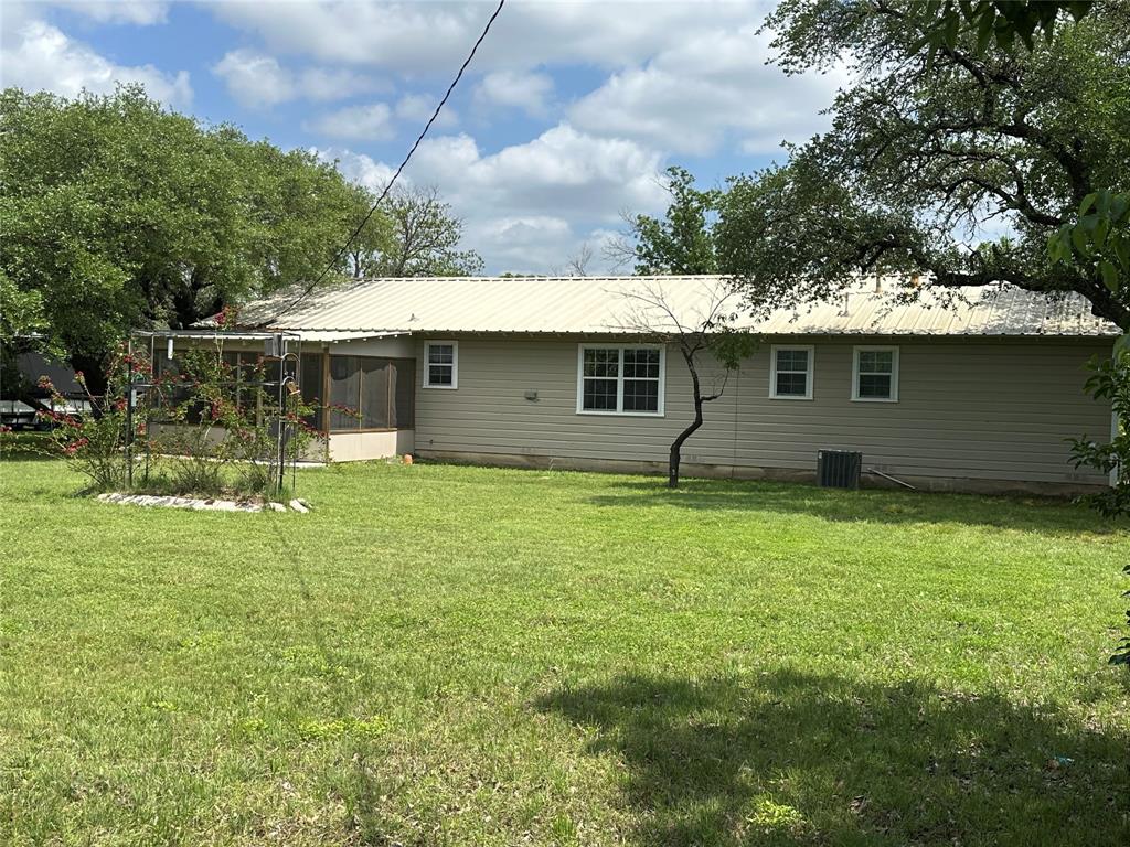406 South Williams Street Hamilton, TX 76531 - Photo 34 of 35 a front view of house with yard and green space