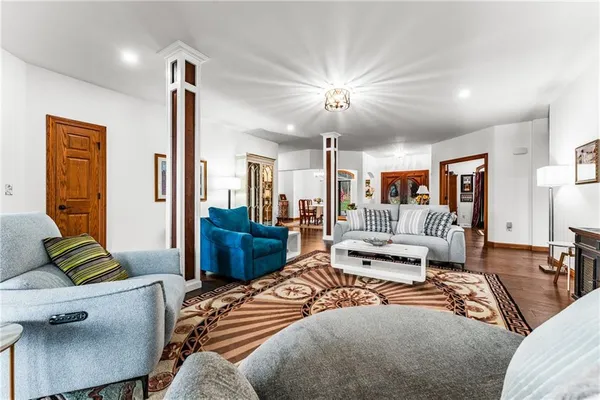 a bedroom with furniture and a view of bedroom