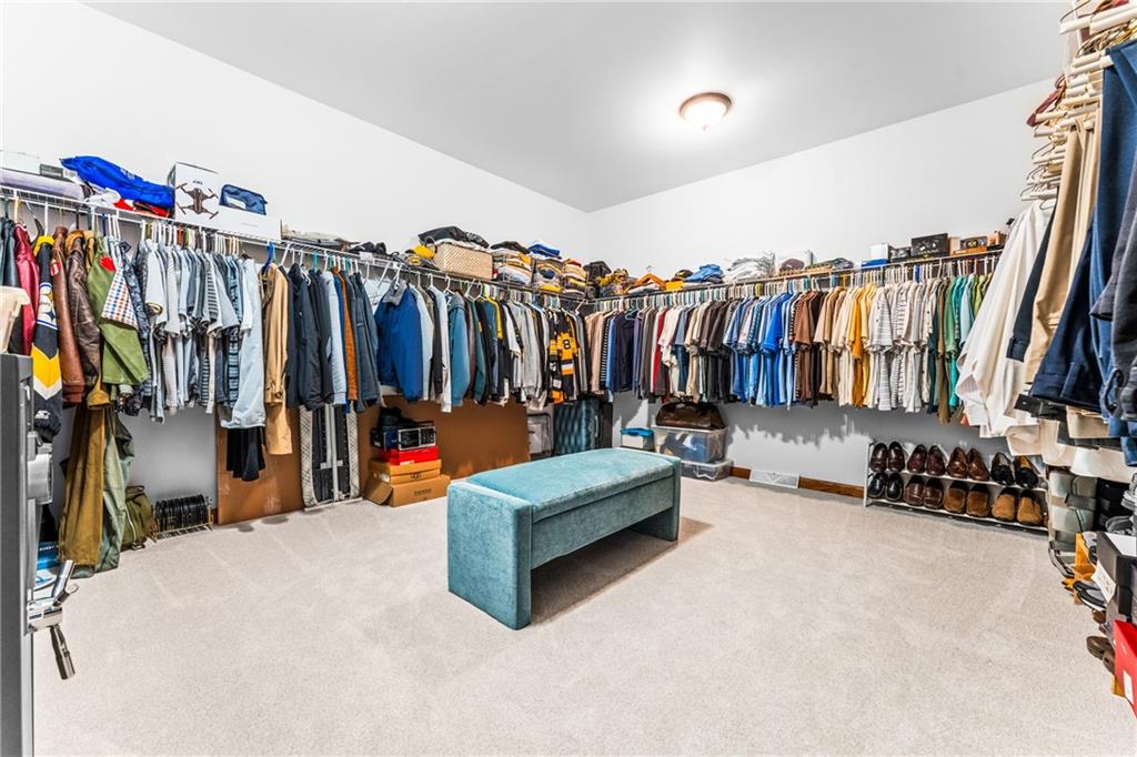 365 South Penn Road Franklin, PA 16323 - Photo 21 of 45 a view of walk in closet with clothes and shoes