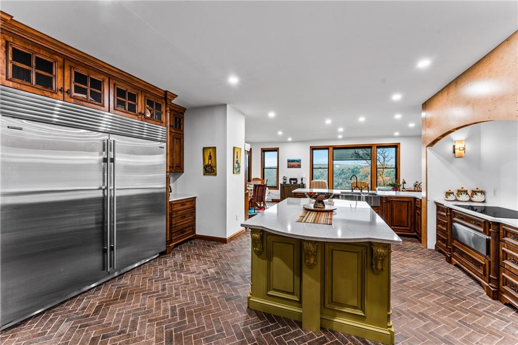 365 South Penn Road Franklin, PA 16323 - Photo 37 of 48 a kitchen with sink refrigerator and stove