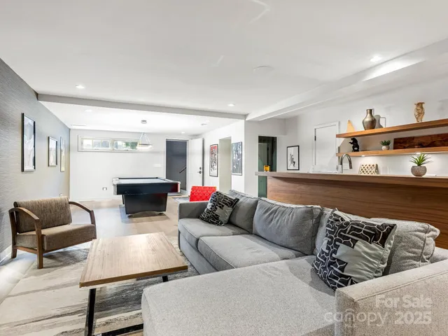 a living room with furniture and a couch