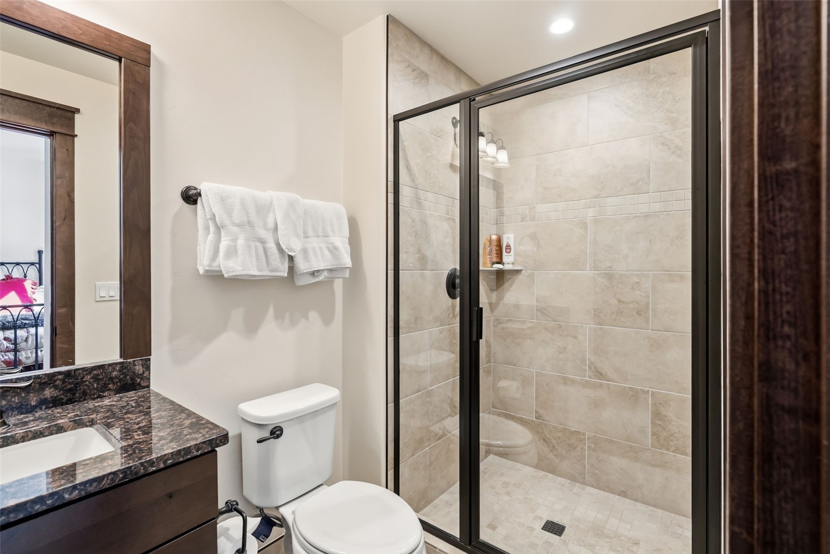 59 Erickson Loop, Unit 4B Keystone, CO 80435 - Photo 44 of 50 a bathroom with a sink toilet and shower