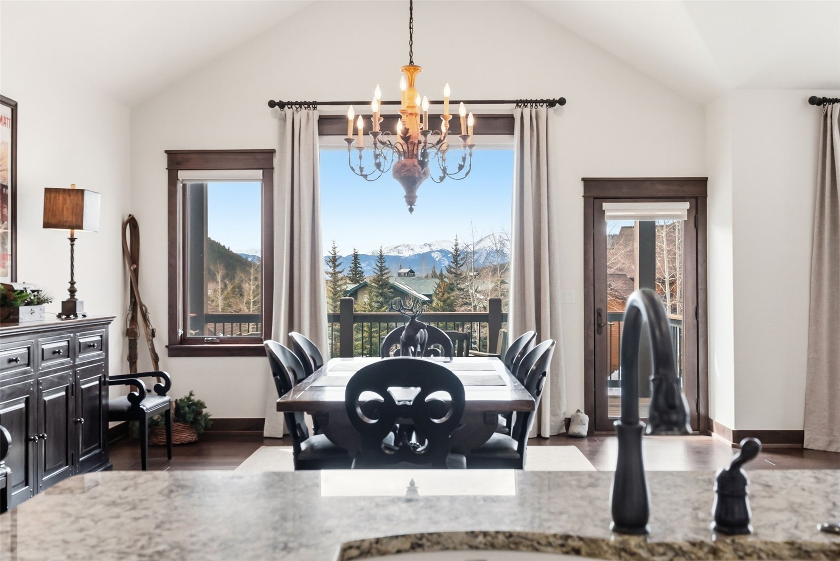 59 Erickson Loop, Unit 4B Keystone, CO 80435 - Photo 6 of 50 a living room with couch and large windows