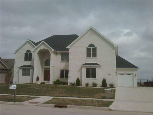 4006 Fullerton Bloomington, IL 61705 - Photo 1 of 1 a front view of a house with a yard