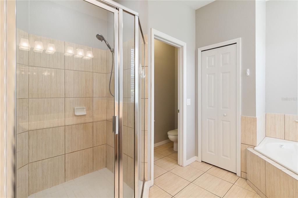11322 Rapallo Lane Windermere, FL 34786 - Photo 17 of 39 a bathroom with a shower and a sink