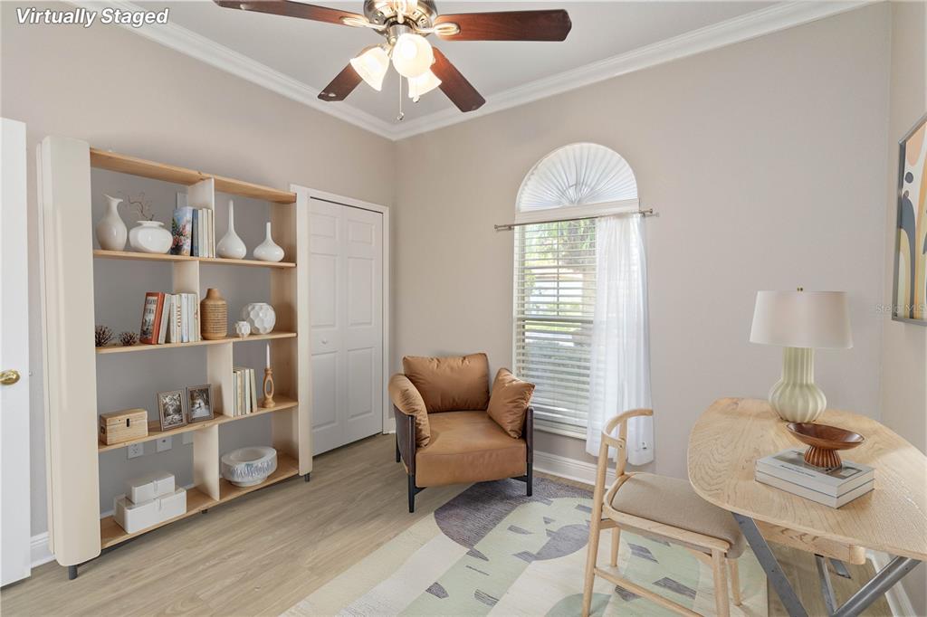 11322 Rapallo Lane Windermere, FL 34786 - Photo 22 of 39 a workspace with furniture window and wooden floor