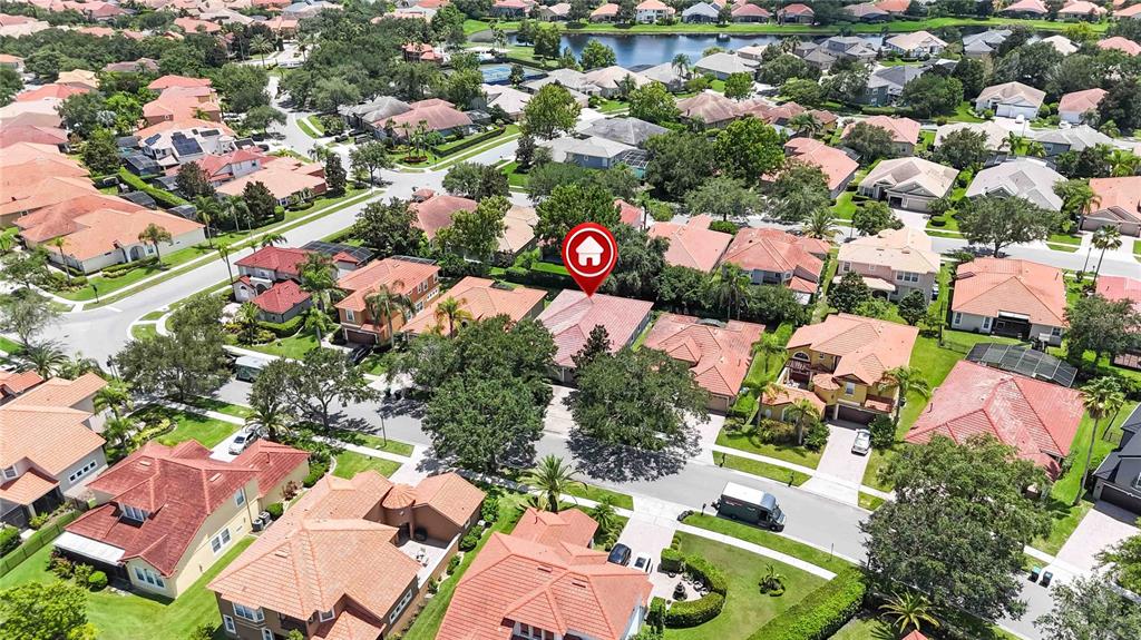 11322 Rapallo Lane Windermere, FL 34786 - Photo 27 of 39 an aerial view of residential houses with outdoor space and street view