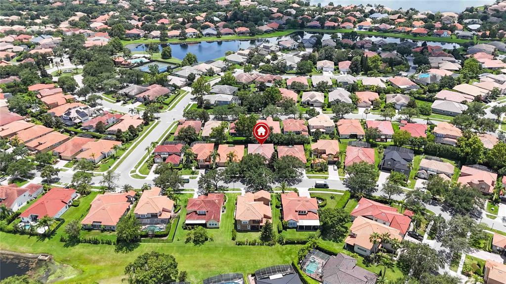 11322 Rapallo Lane Windermere, FL 34786 - Photo 37 of 39 an aerial view of residential houses with outdoor space and swimming pool