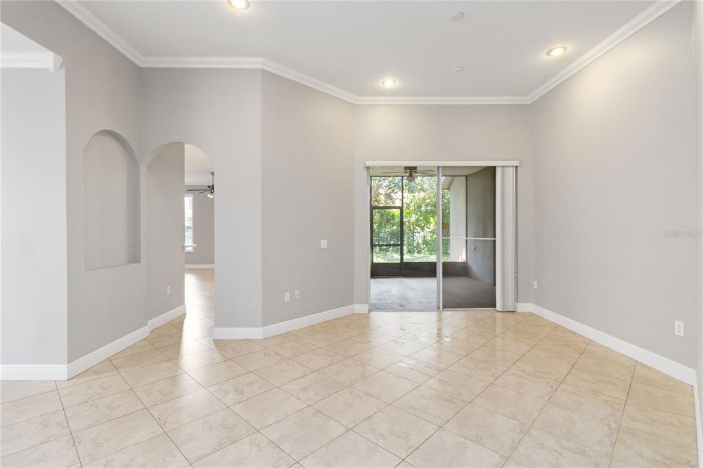 11322 Rapallo Lane Windermere, FL 34786 - Photo 7 of 39 a view of an empty room with a window