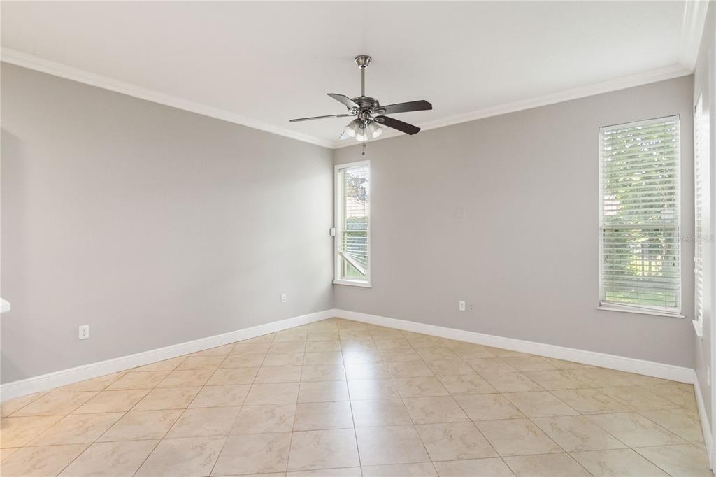 11322 Rapallo Lane Windermere, FL 34786 - Photo 8 of 39 a view of an empty room with a window