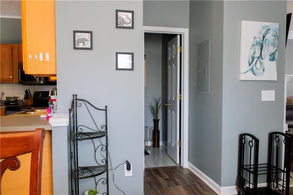 50 Berkeley Place Cartersville, GA 30121 - Photo 16 of 54 a view of a hallway with workspace and mirror on the wall