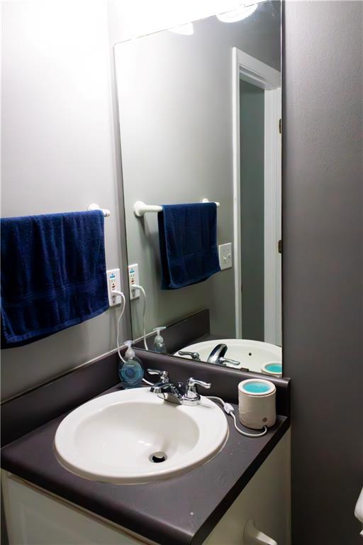 50 Berkeley Place Cartersville, GA 30121 - Photo 21 of 54 a bathroom with a sink and a mirror