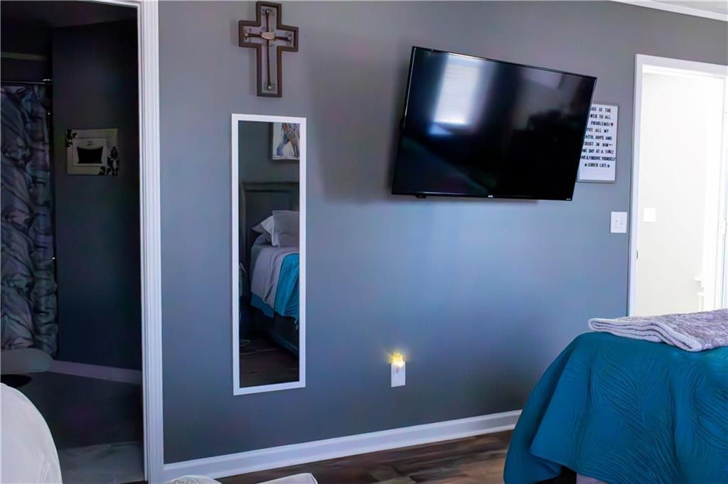 50 Berkeley Place Cartersville, GA 30121 - Photo 31 of 54 a view of a livingroom with furniture and wooden floor