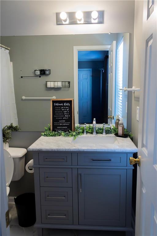 50 Berkeley Place Cartersville, GA 30121 - Photo 41 of 54 a room with a sink and a mirror