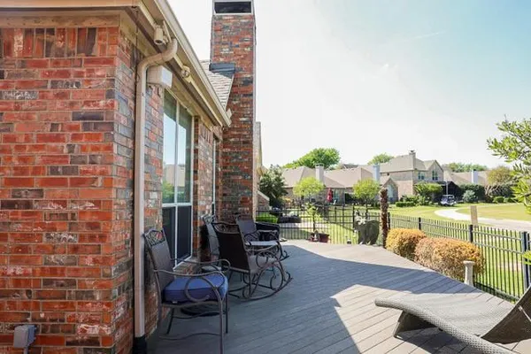a backyard of a house with seating space