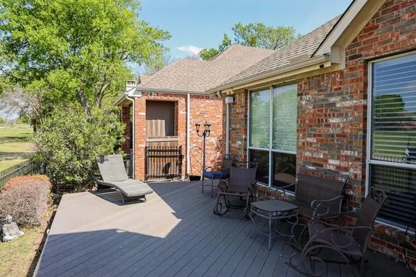 a backyard of a house with seating space