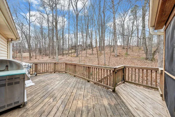 a view of balcony with wooden floor