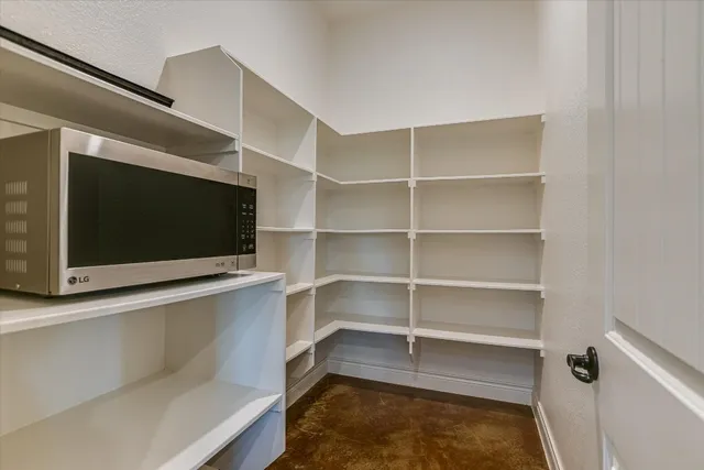 a view of a room with a flat screen tv