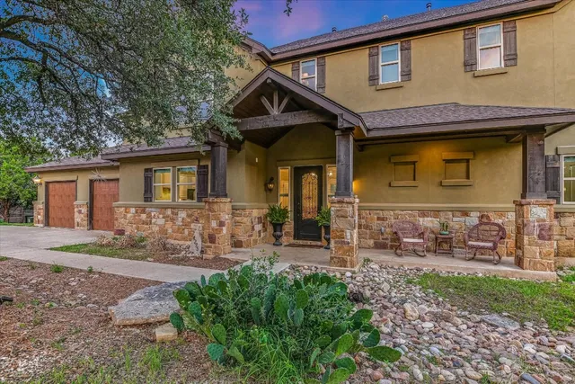 a front view of a house with patio
