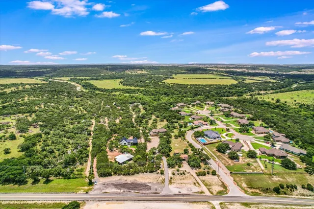 a view of an ocean and a yard