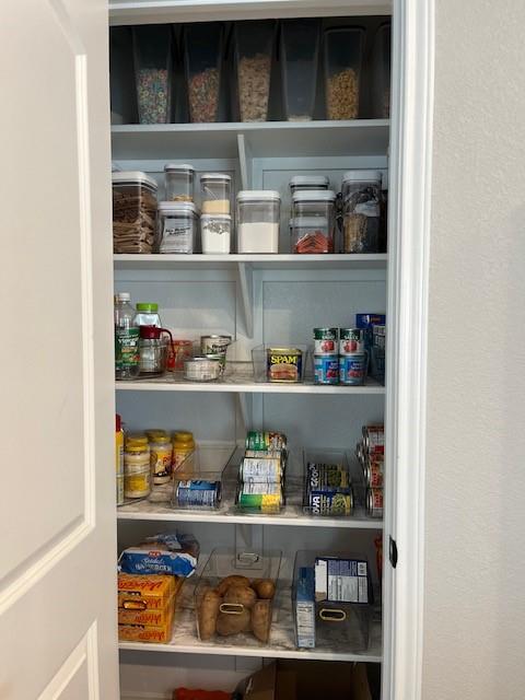 4013 Bravo Ranch Road Waco, TX 76705 - Photo 13 of 33 a cabinet with open kitchen