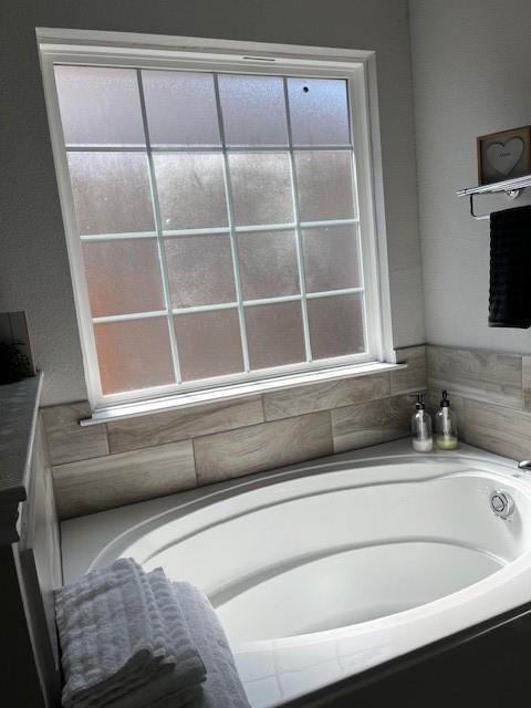 4013 Bravo Ranch Road Waco, TX 76705 - Photo 19 of 33 a bathroom with a sink and a toilet