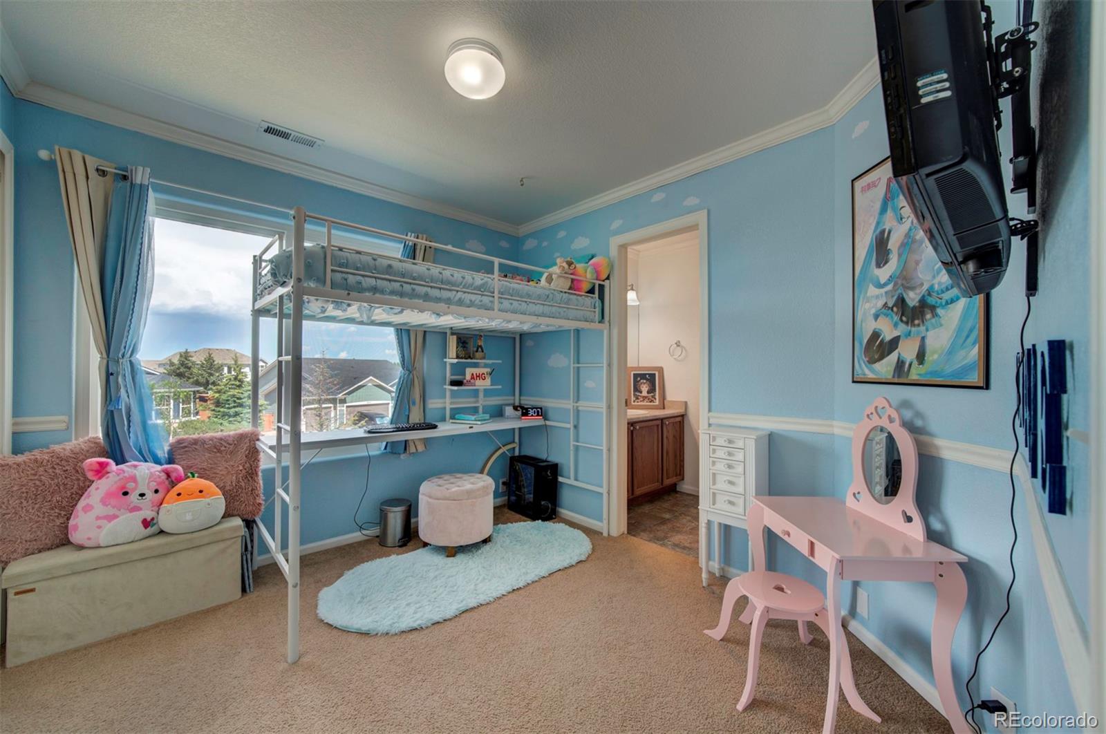 9364 Prairie Dunes Road Peyton, CO 80831 - Photo 14 of 18 a dining room with furniture and a floor to ceiling window
