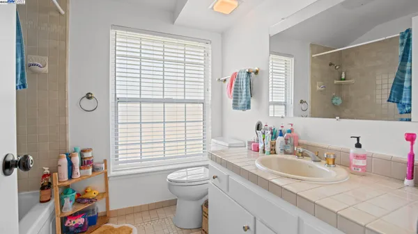 a view of a garden with patio