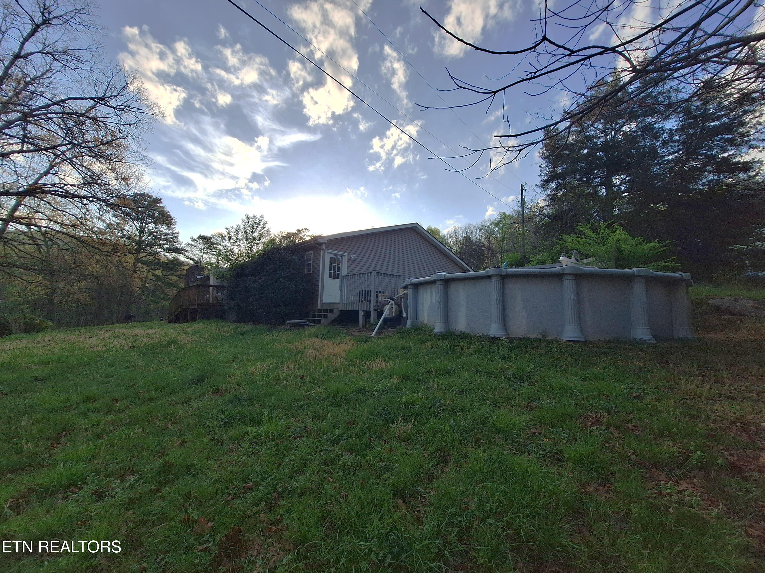 2381 Classic Way Powell, TN 37849 - Photo 25 of 32 Pool House Side