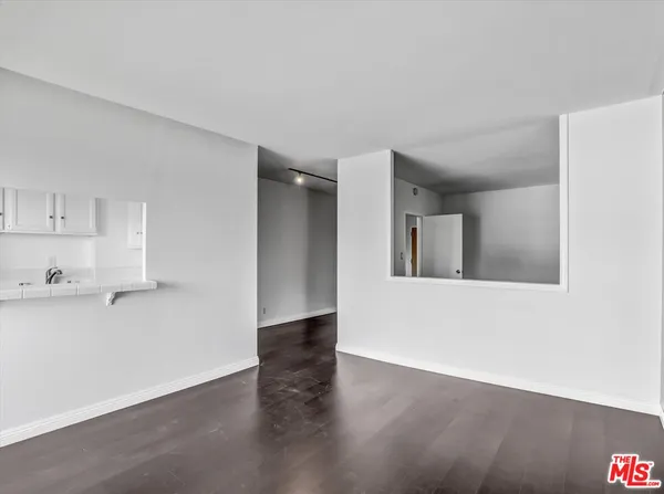 a view of kitchen with wooden floor