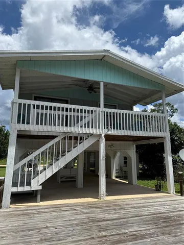 a view of a house with a deck