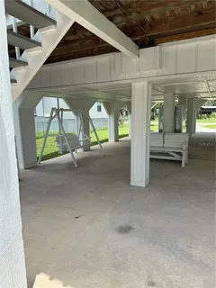 a view of swimming pool with two windows
