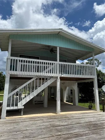 a view of a house with a deck