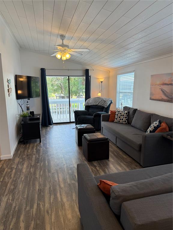 1712 Northeast King Street Steinhatchee, FL 32359 - Photo 6 of 18 a living room with furniture and a flat screen tv