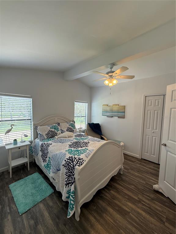 1712 Northeast King Street Steinhatchee, FL 32359 - Photo 10 of 18 a bedroom with a bed and a window