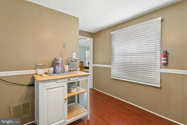 a view of workspace with wooden floor