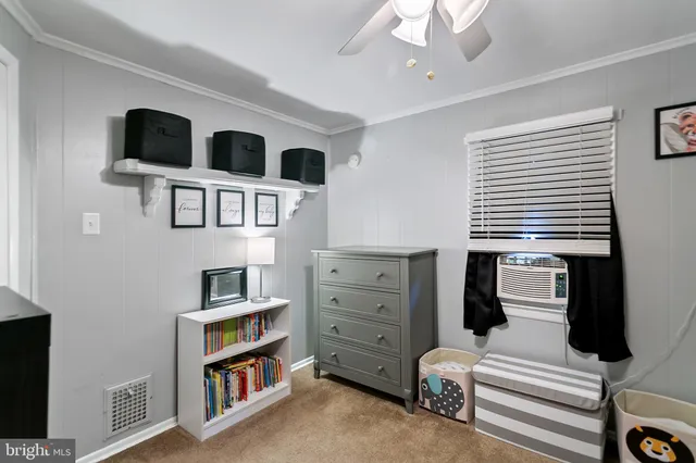 a view of living room and workspace