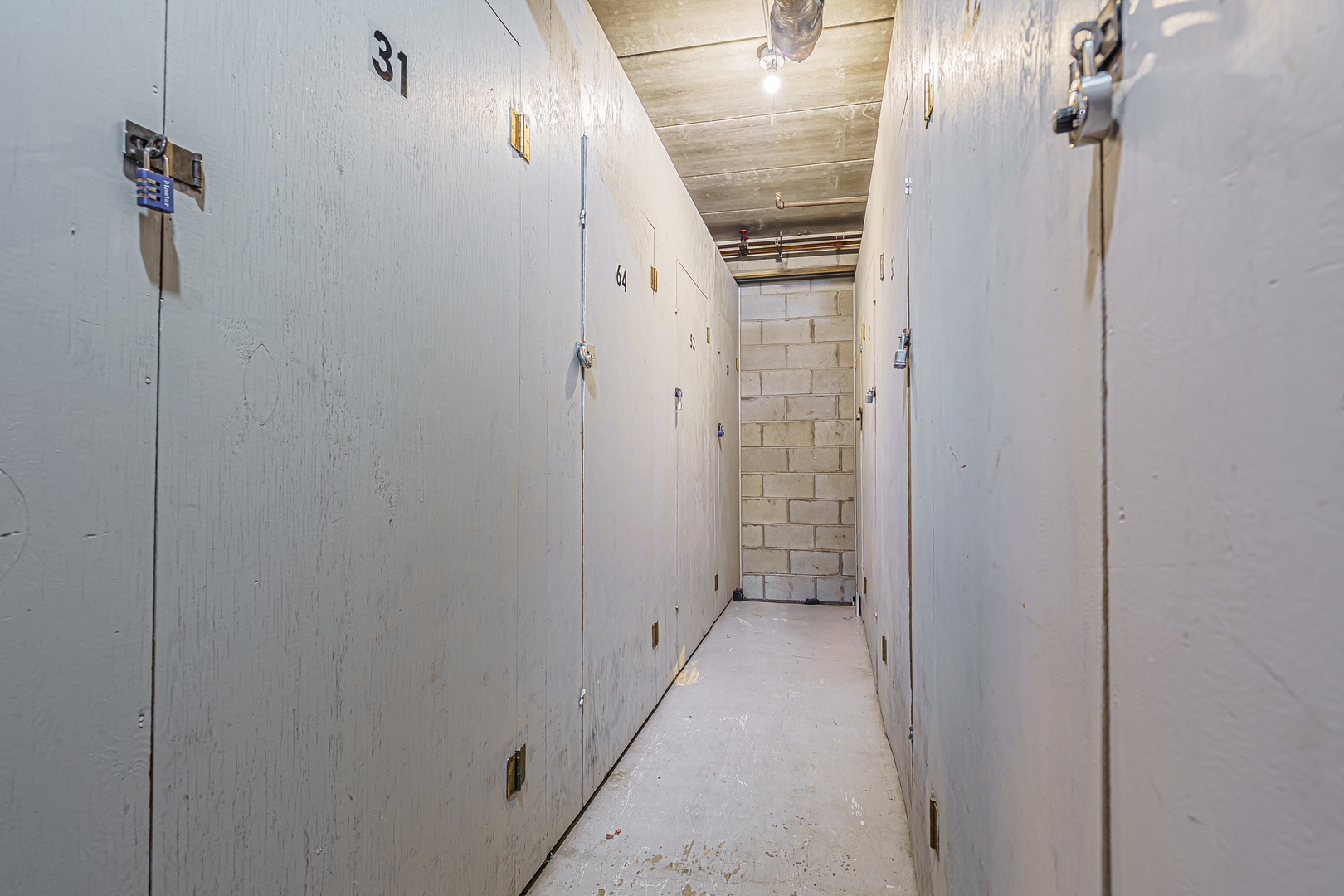 659 South Des Plaines River Road, Unit 2A Des Plaines, IL 60016 - Photo 23 of 28 a view of a hallway with wooden floor and a shower