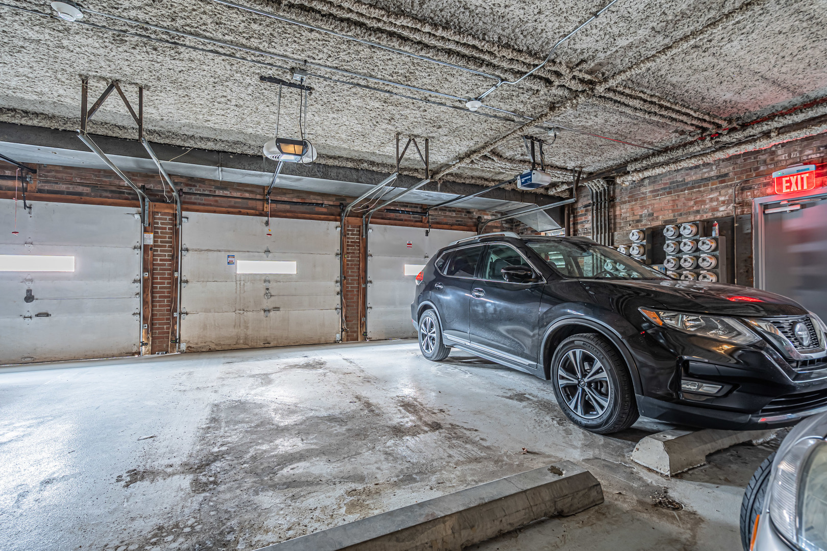 659 South Des Plaines River Road, Unit 2A Des Plaines, IL 60016 - Photo 24 of 28 a view of a cars parking space
