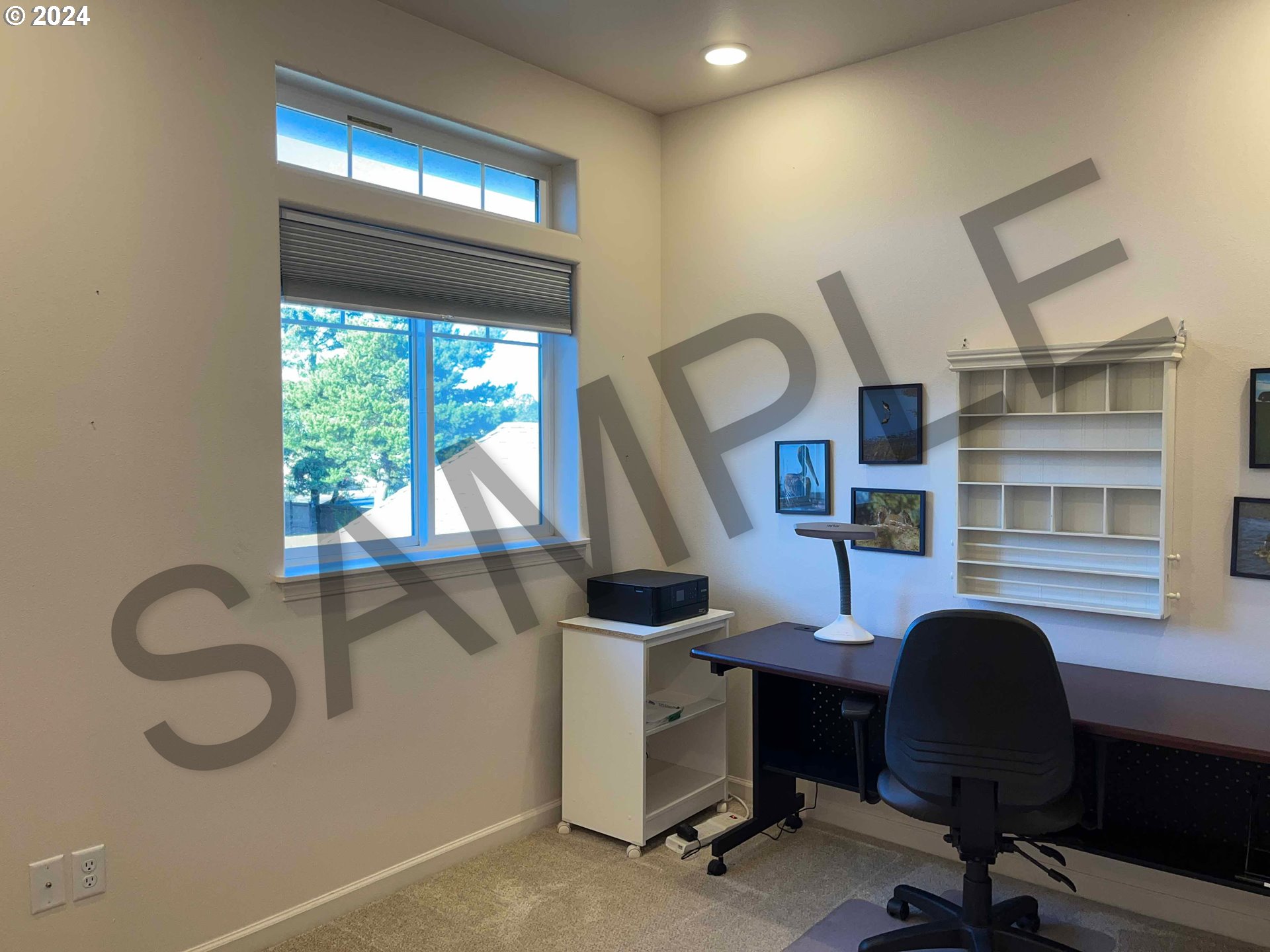 1587 37th Street Florence, OR 97439 - Photo 23 of 47 a view of a workspace with furniture and a window