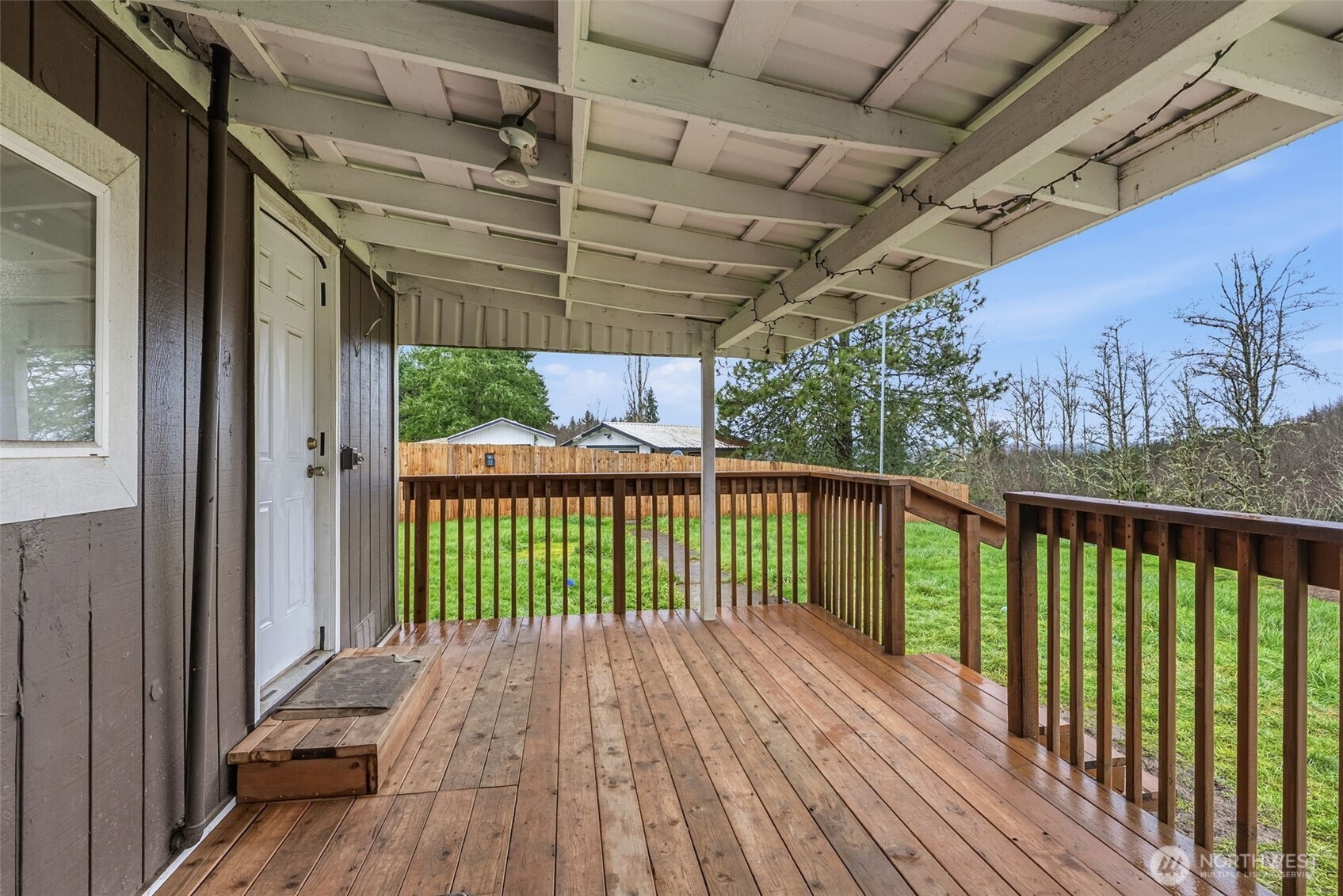 228 Holcomb Spur Road Kelso, WA 98626 - Photo 19 of 23 a view of a balcony with wooden floor