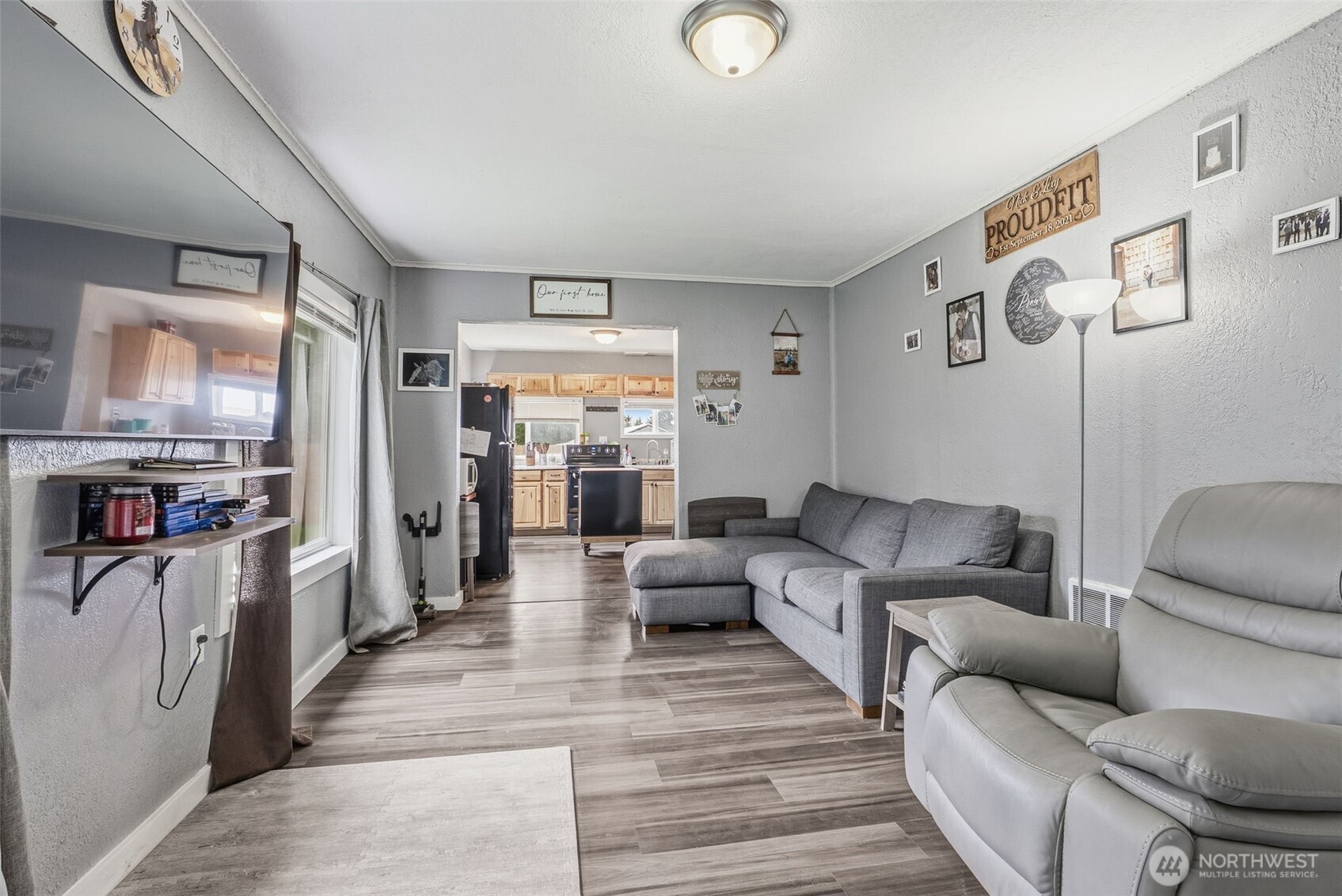 228 Holcomb Spur Road Kelso, WA 98626 - Photo 6 of 23 a living room with furniture and a large window