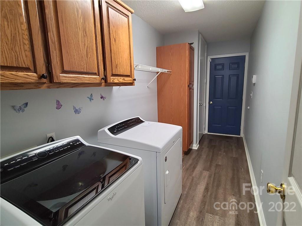 24955 Ridgecrest Road Locust, NC 28097 - Photo 17 of 22 a utility room with dryer and washer