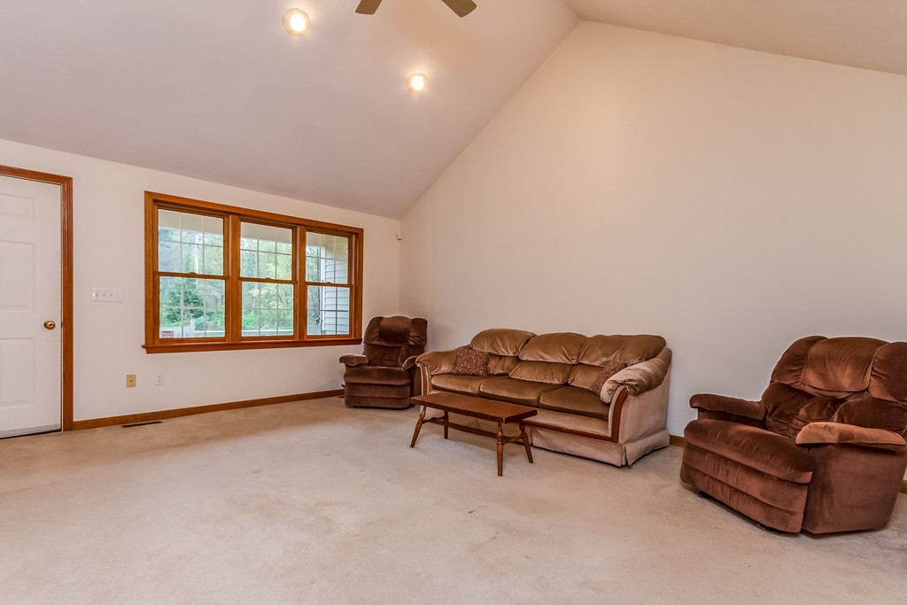84 Little Turnpike Road Shirley, MA 01464 - Photo 12 of 30 a living room with furniture and a window