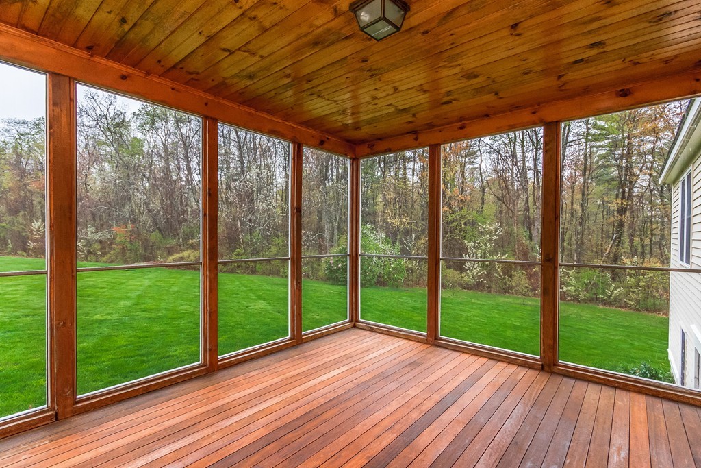 84 Little Turnpike Road Shirley, MA 01464 - Photo 14 of 30 a view of a porch with a big yard