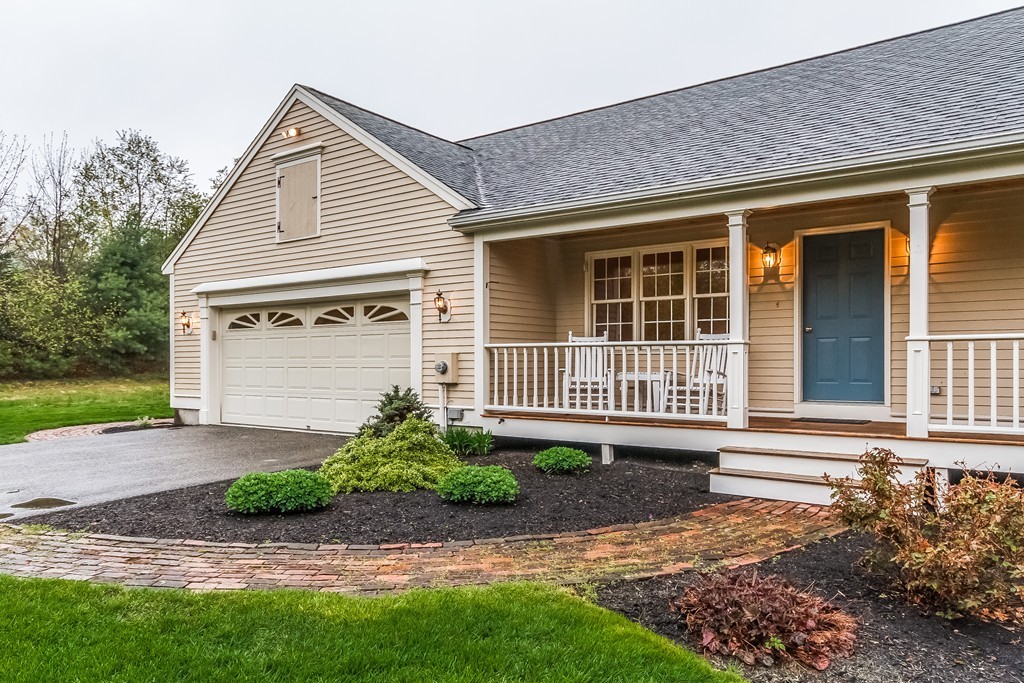 84 Little Turnpike Road Shirley, MA 01464 - Photo 2 of 30 a front view of a house with garden