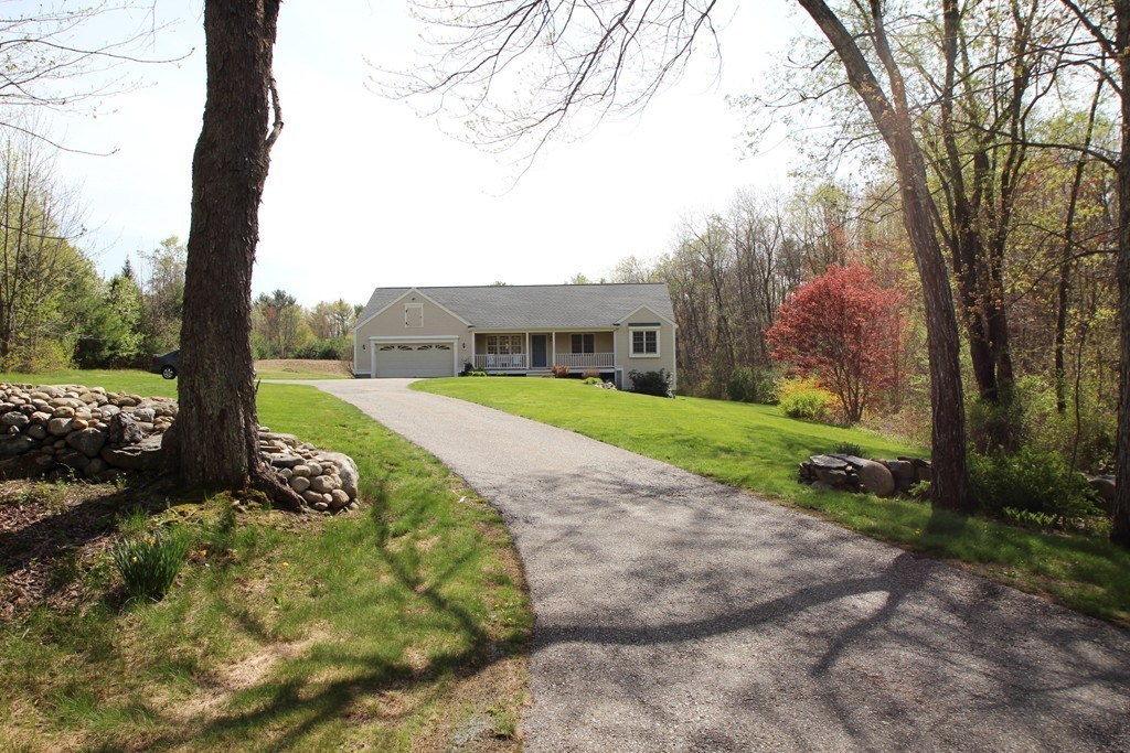 84 Little Turnpike Road Shirley, MA 01464 - Photo 29 of 30 a view of a house with a yard