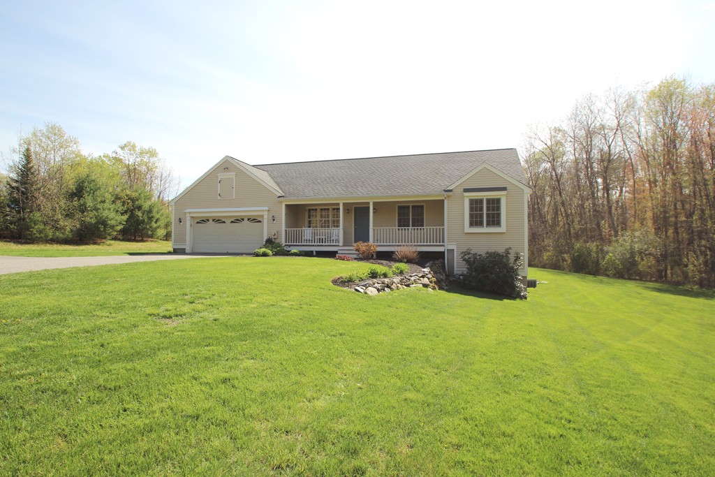 84 Little Turnpike Road Shirley, MA 01464 - Photo 30 of 30 a front view of a house with yard and green space