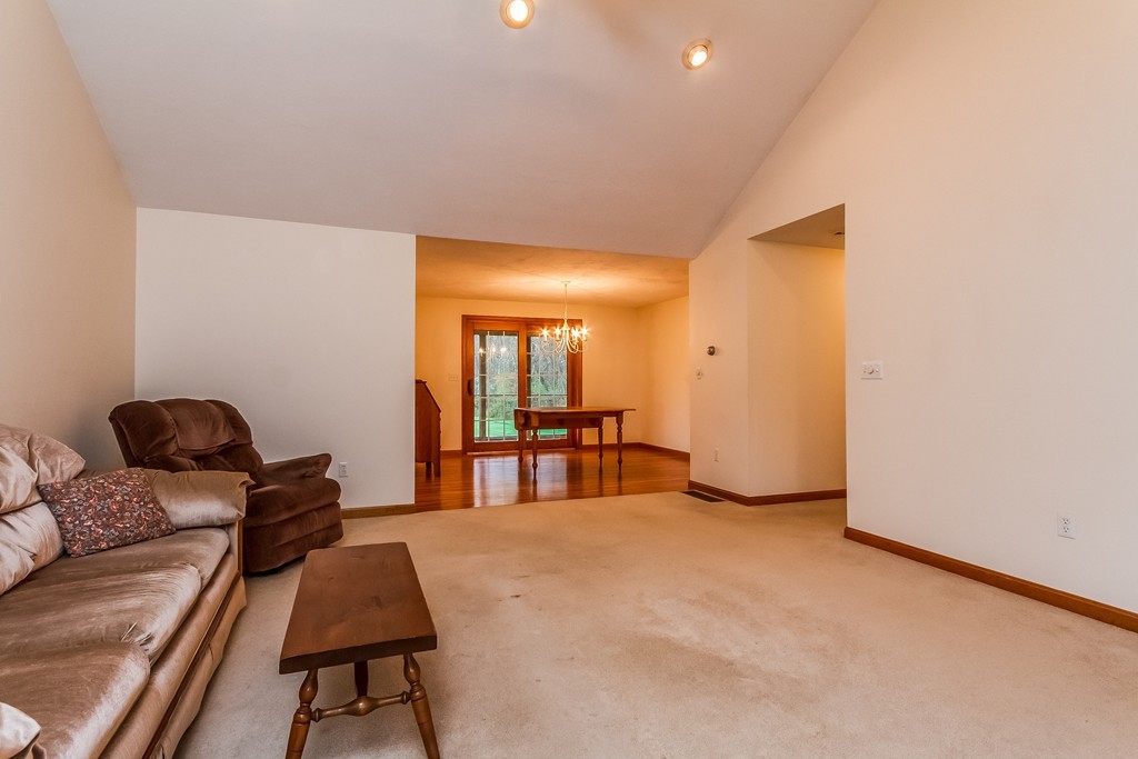 84 Little Turnpike Road Shirley, MA 01464 - Photo 9 of 30 a bedroom with furniture and a window
